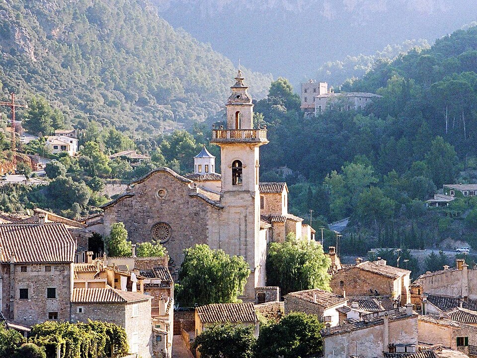 Valldemossa village in Mallorca where Chopin and George Sand stayed, historic stone houses and church in a Mediterranean setting